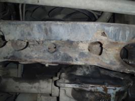 6odkręcamy dwie nakrętki trzymające maglownice.jpg